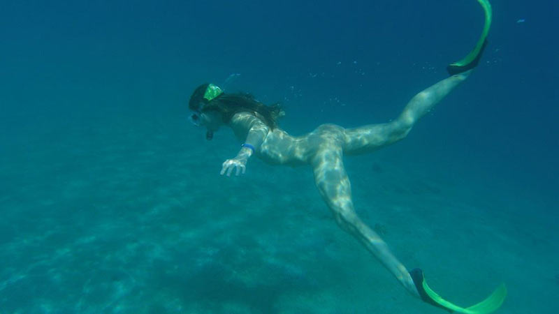 Swimming naked in the ocean